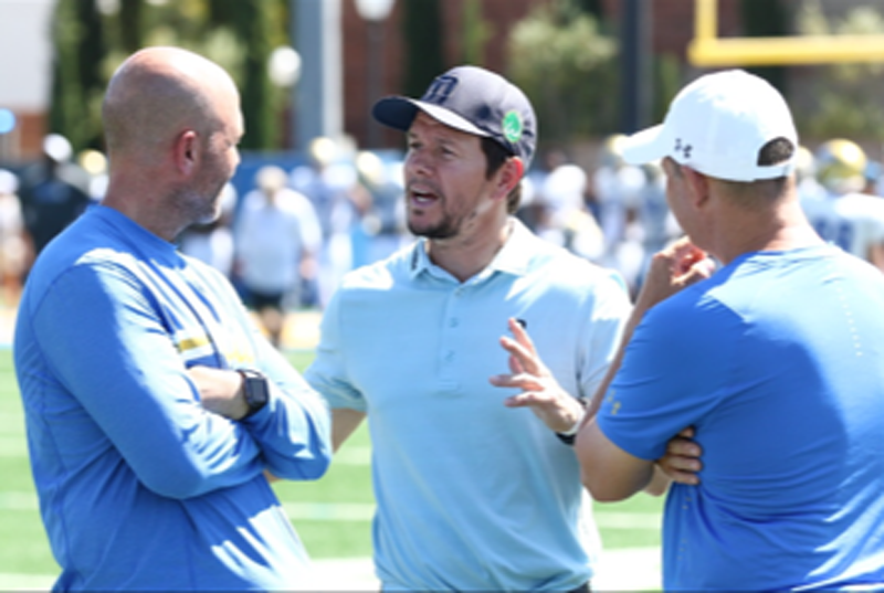 Scot Ruggles, Mark Wahlberg, and New England Patriot Scout Chris Caminiti at UCLA Practice